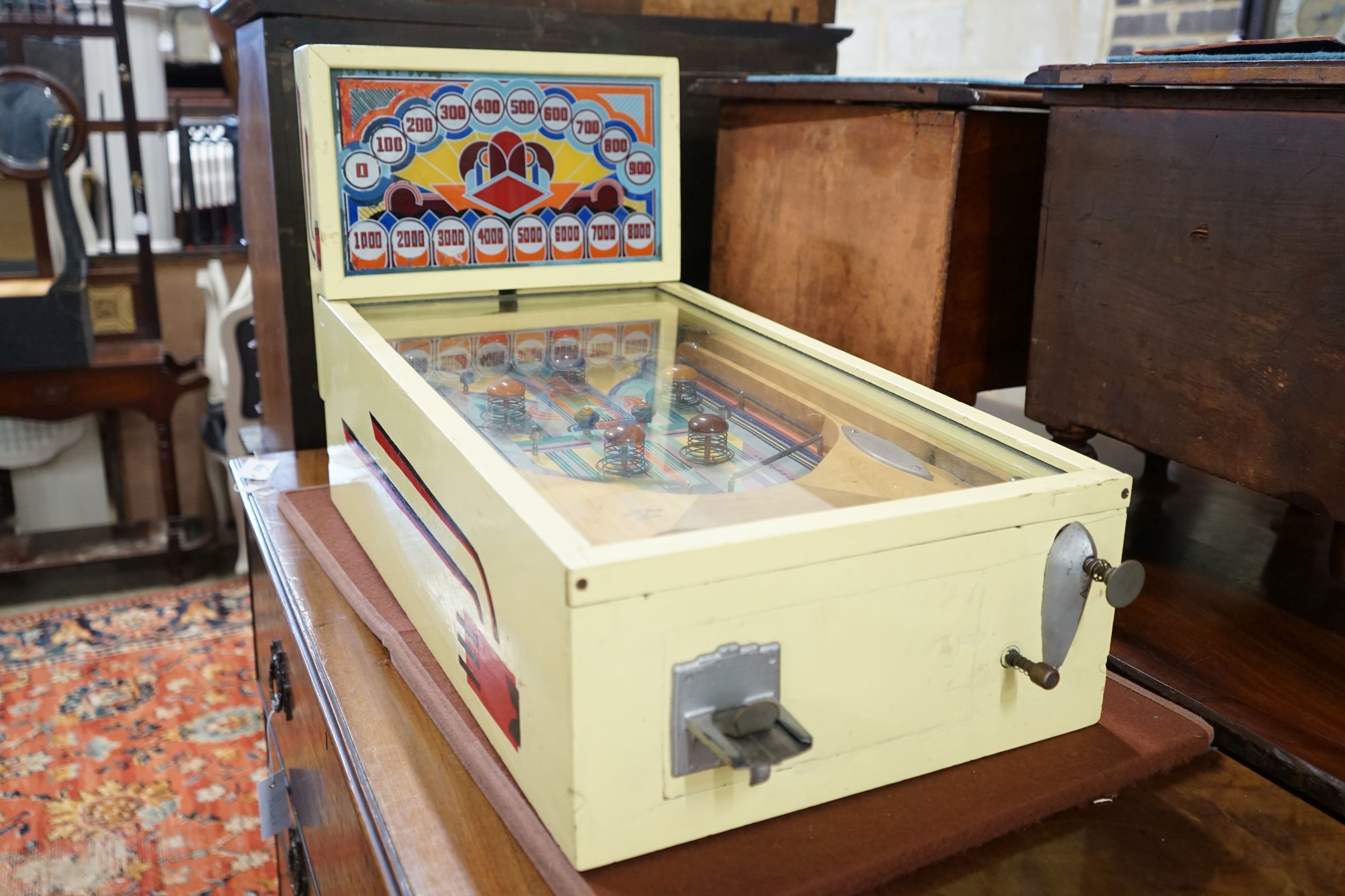 A vintage American 'Junior' pinball machine, width 39cm, length 72cm, height 45cm, ITEM ONLY A COLLECTOR'S ITEM - REWIRE REQUIRED BEFORE USE